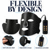 Cellovia black silicone LED photon rejuvenation mask with handheld controller, adjustable straps, and flexible design.